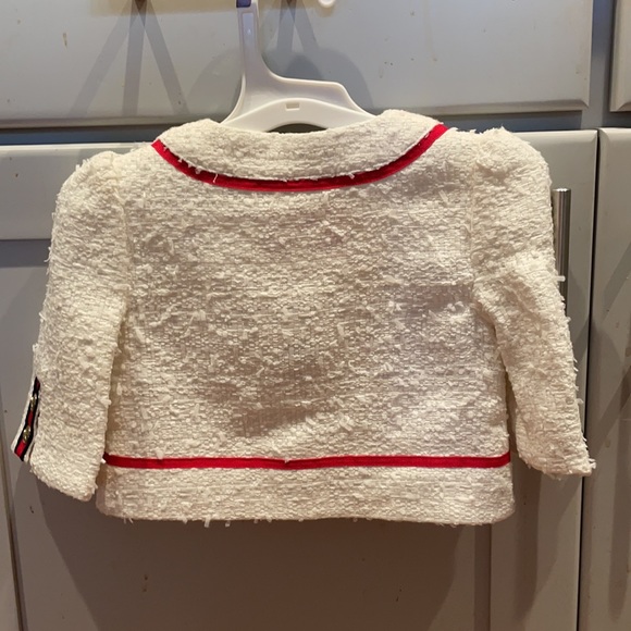 Creamy white with red & navy bow - Picture 2 of 7